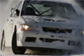 Mitsubishi Lancer Evo buszujce w niegu